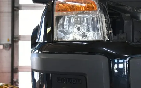 Ford Fusion z pękniętą sprężyną podczas naprawy w MOTOER